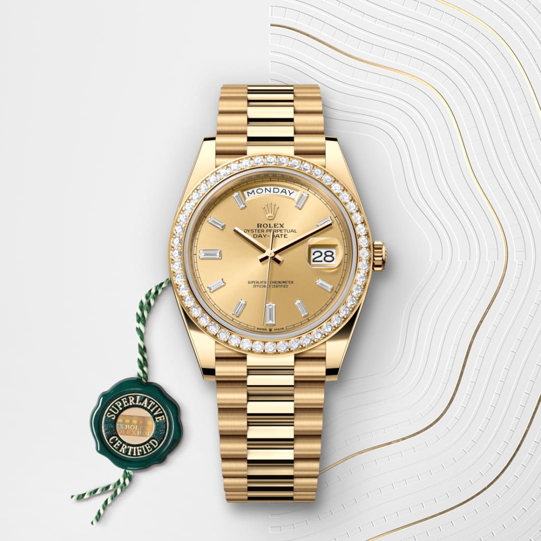 Gold Rolex watch with diamond bezel, day and date display, and a green Superlative Certified tag.