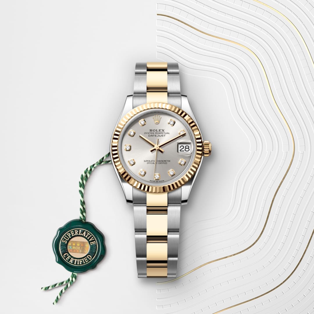 A two-tone Rolex watch with a silver and gold band, diamond markers, and a Superlative Certified tag.