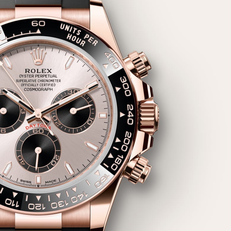 Close-up of a Rolex Oyster Perpetual Cosmograph Daytona watch with a black bezel and rose gold accents.