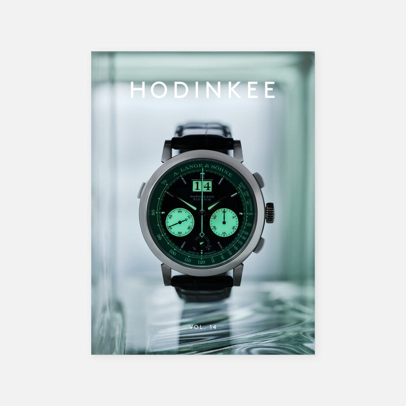 The cover of Hodinkee Magazine, Volume 14, by Hodinkee features a luxury wristwatch with a green and black dial.