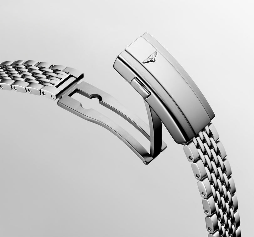 Close-up of the Longines Legend Divers stainless steel bracelet with partially open clasp, highlighting its fine details.