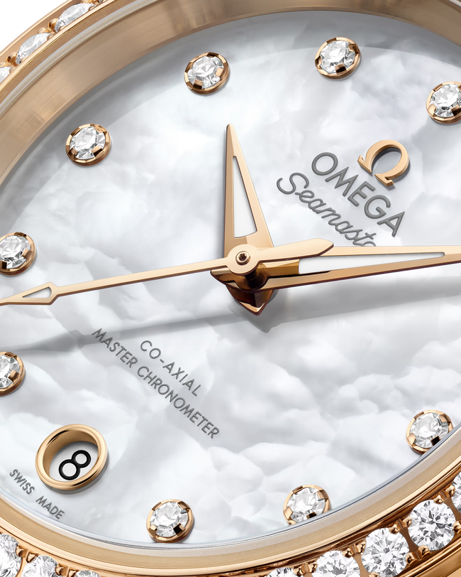 OMEGA Seamaster Aqua Terra 150M 30mm, Moonshine™ gold on Moonshine™ gold Watch, with a Diamond Bezel and Mother-of-Pearl Dial with Diamond Markers on a Moonshine™ gold integrated bracelet.