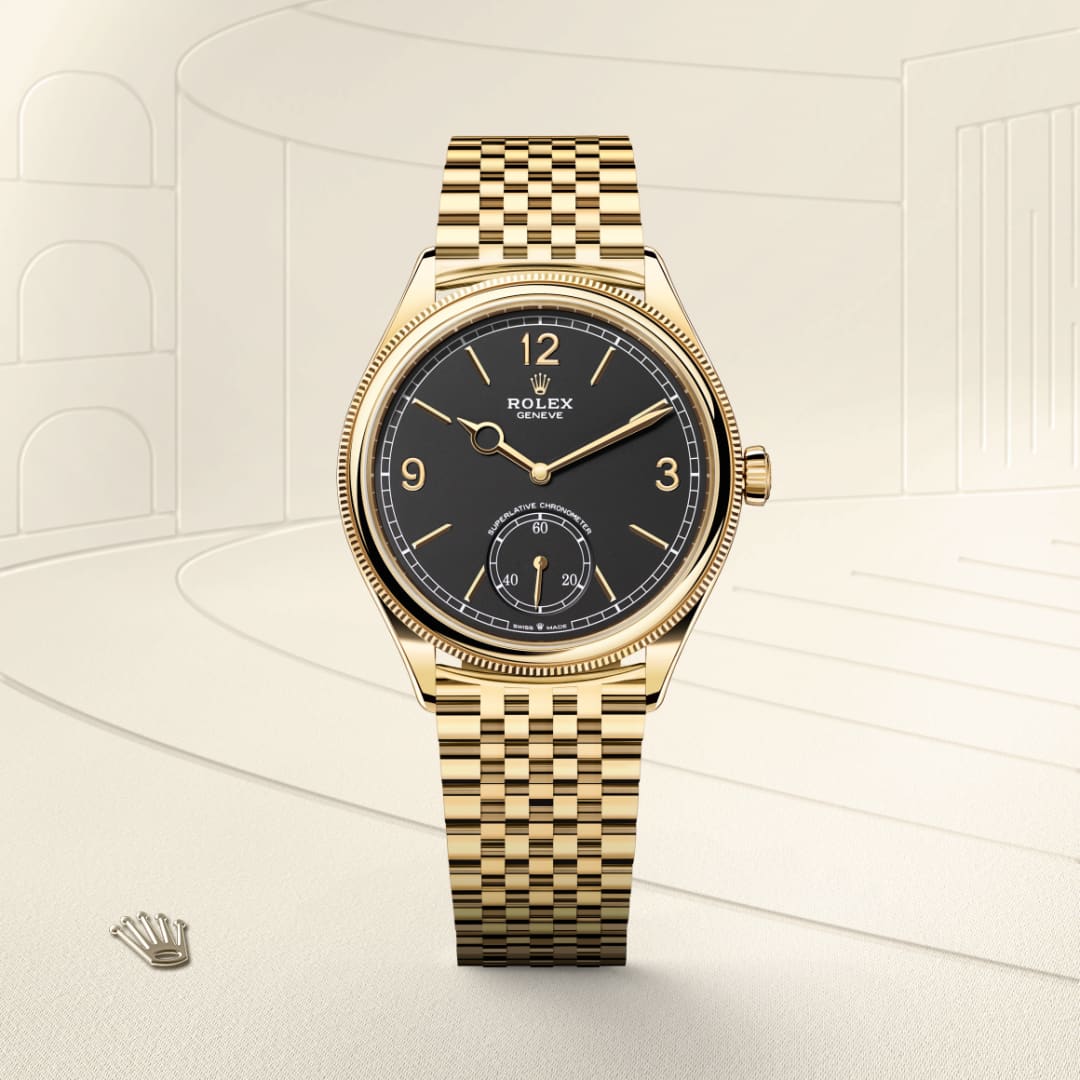 Gold Rolex watch with a black dial and jubilee bracelet, displayed upright on a beige background with a crown logo.