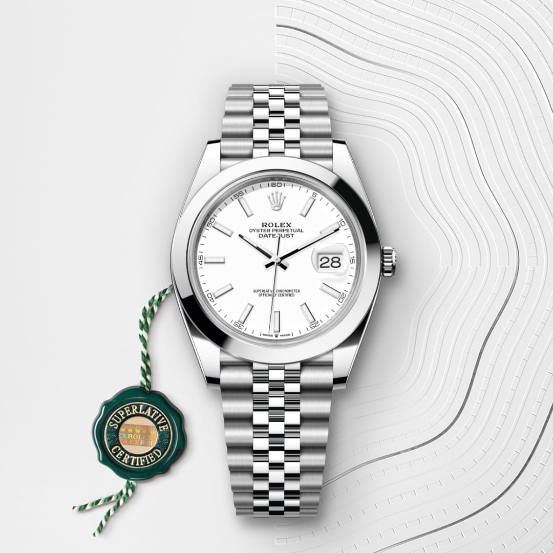 Silver Rolex Datejust watch with a white dial and Jubilee bracelet on a textured white background.