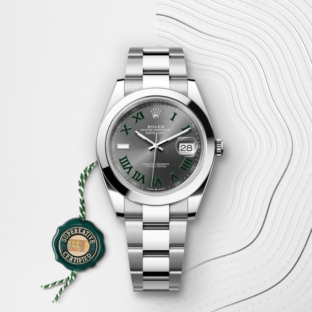 Rolex Datejust watch with green Roman numerals, silver bracelet, and a Superlative Certified tag.