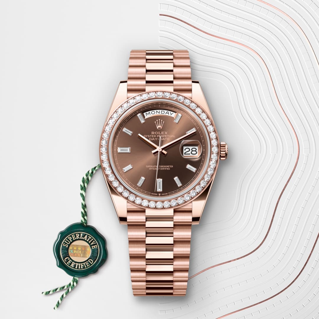 A rose gold Rolex watch with diamond bezel, brown dial, and day-date display, with a green certification tag.