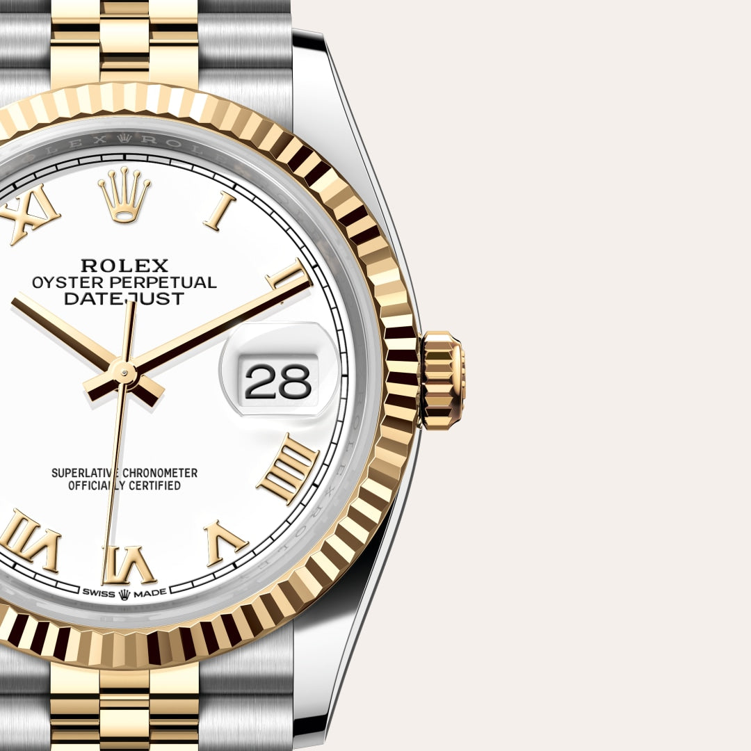 Close-up of a Rolex Datejust watch with a white dial, gold Roman numerals, and a two-tone metal bracelet.