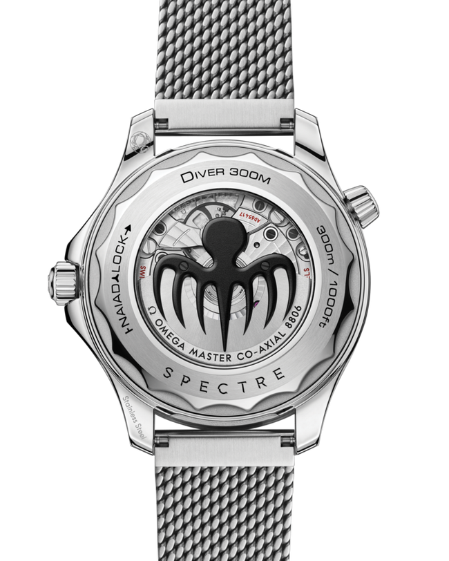 Black and stainless steel diver watch with mesh band, showing caseback with Spectre octopus logo and "Diver 300M" text.