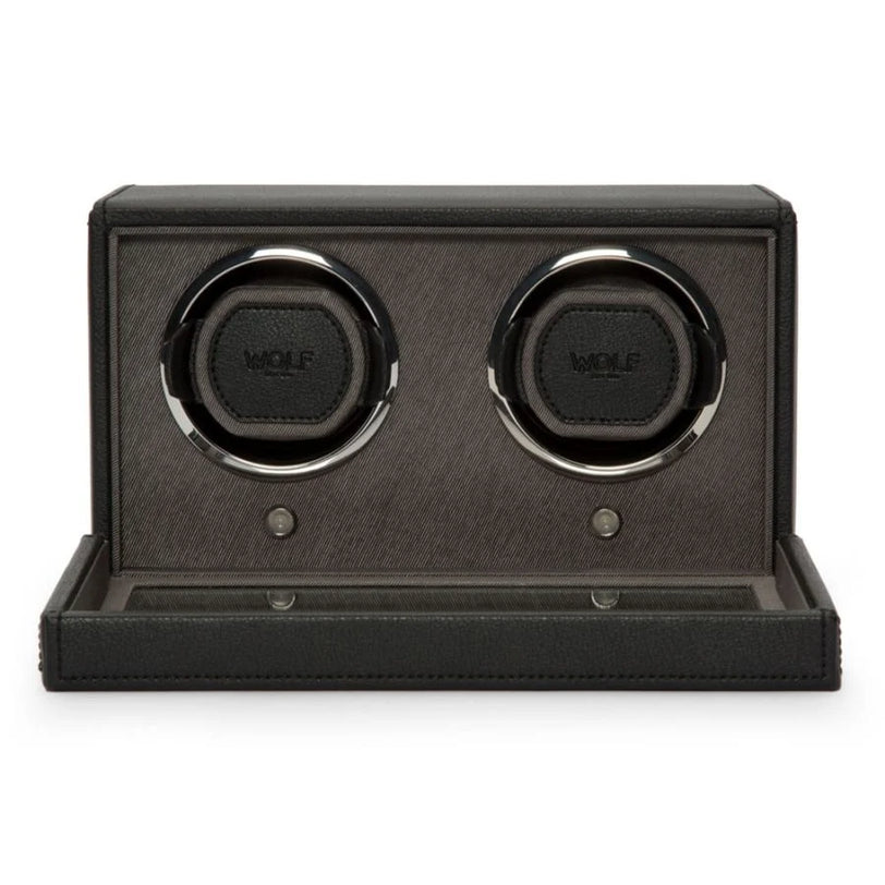 Black double watch winder with two circular watch holders and pull-out base drawer.