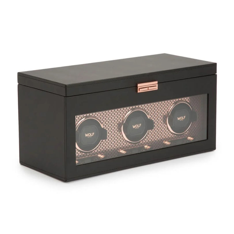 Black rectangular watch winder box with three circular watch slots visible through front window and rose gold accents.