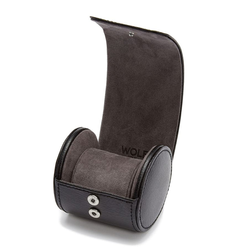 Black leather watch roll with gray suede interior, snap closures, and curved cylindrical base for storing one watch.