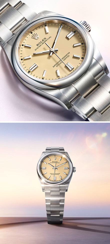 A stainless steel Rolex Oyster Perpetual watch with a champagne dial on a matching metal bracelet.