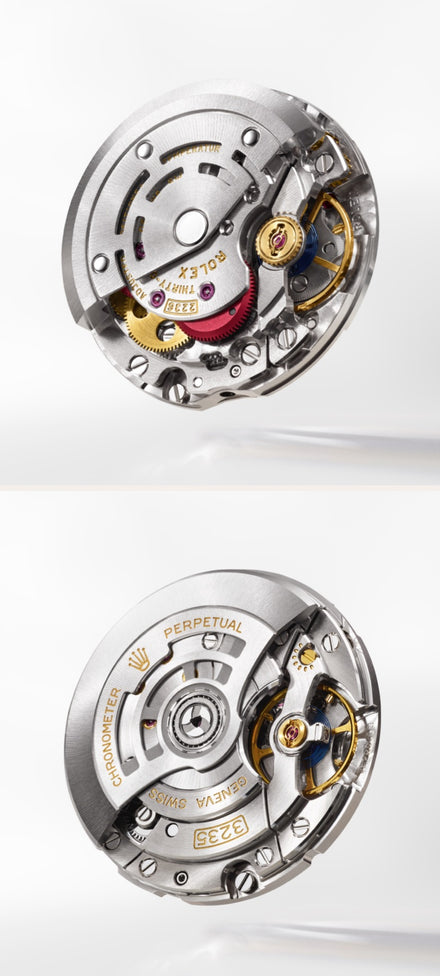 Close-up of two intricate Rolex watch movements, showing gears and engraved metal components.