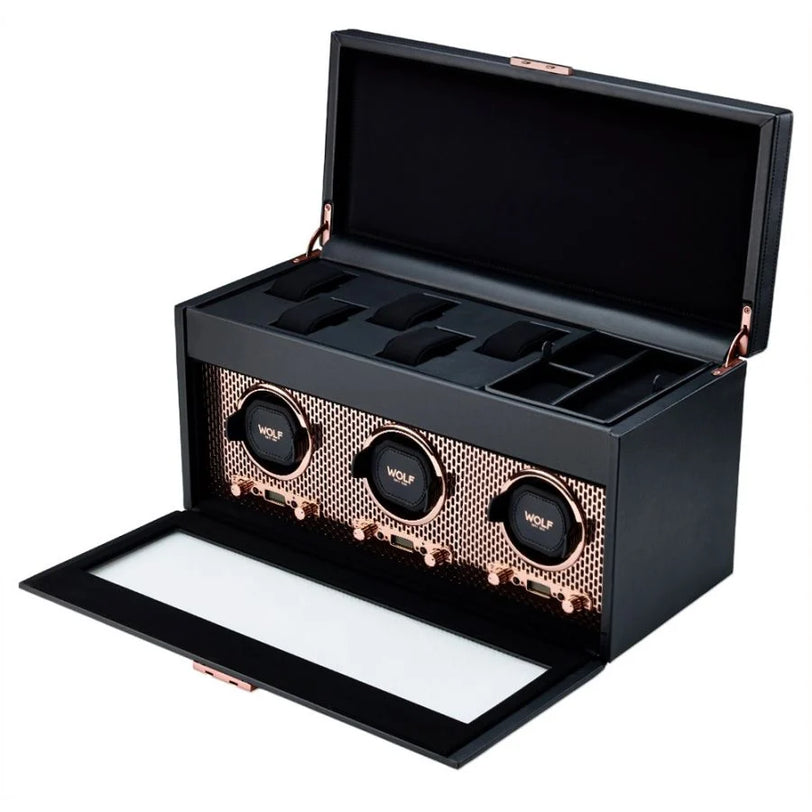 Black watch winder with three rotating mechanisms, mesh front panel, storage compartments in open lid, and lower storage draw