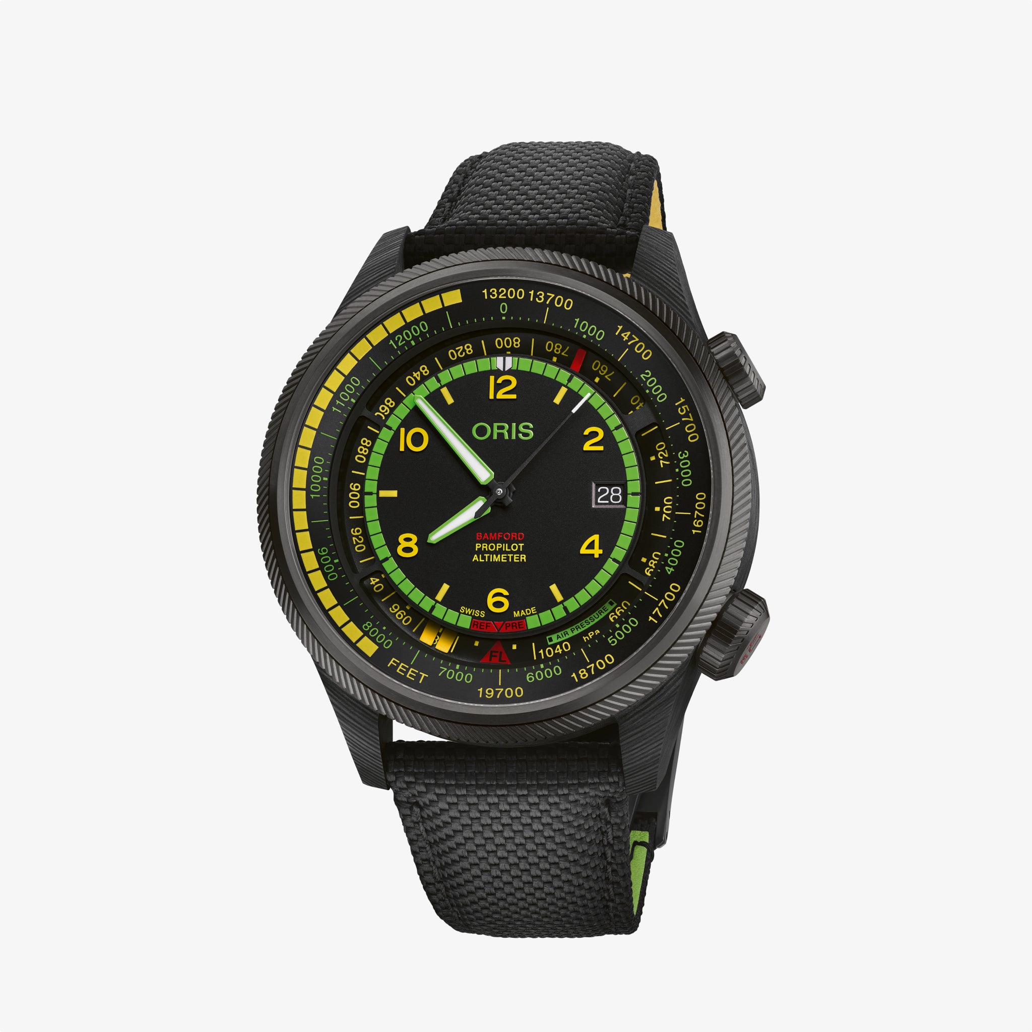 The Oris ProPilot Altimeter Mission Control is a black wristwatch with a textured strap, yellow and green numerals, dual crowns, date at 3 o’clock on the black dial, and a bezel marked for altitude measurements.