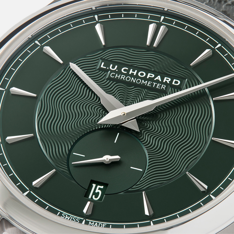 Close-up of the green guilloché dial on the Chopard L.U.C XPS 1860 Officer Limited Edition for Hodinkee, with a white gold case, showing the time 10:08, small seconds subdial, and date window set to 15.