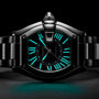 Tonneau-shaped watch with luminous cyan Roman numerals, black dial, two-tone metal bracelet, and crown protector on black bac