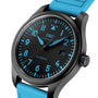 IWC watch with blue strap and black dial on a white background