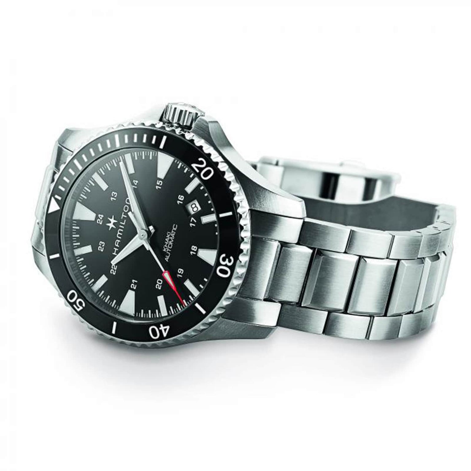 The Hamilton Khaki Navy Scuba Auto wristwatch, featuring a stainless steel case, black dial, silver hour markers, and a metal link band, is showcased against a white background, representing precision and performance.