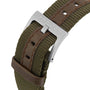 Close-up of the Hamilton Khaki Field Mechanical watch strap in green fabric with brown leather trim and a silver buckle.