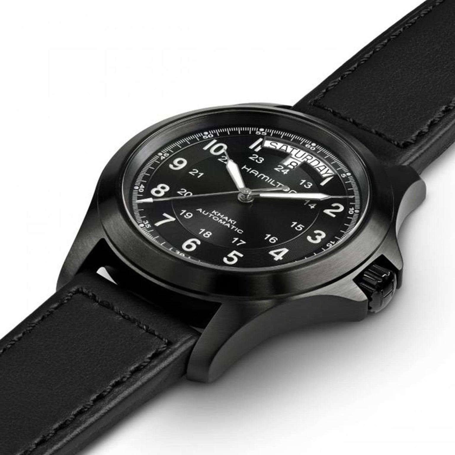 The Hamilton Khaki Field King Auto is a black wristwatch with a black leather strap, white Arabic numerals, and day-date display, embodying the brand’s military-inspired field watch heritage.