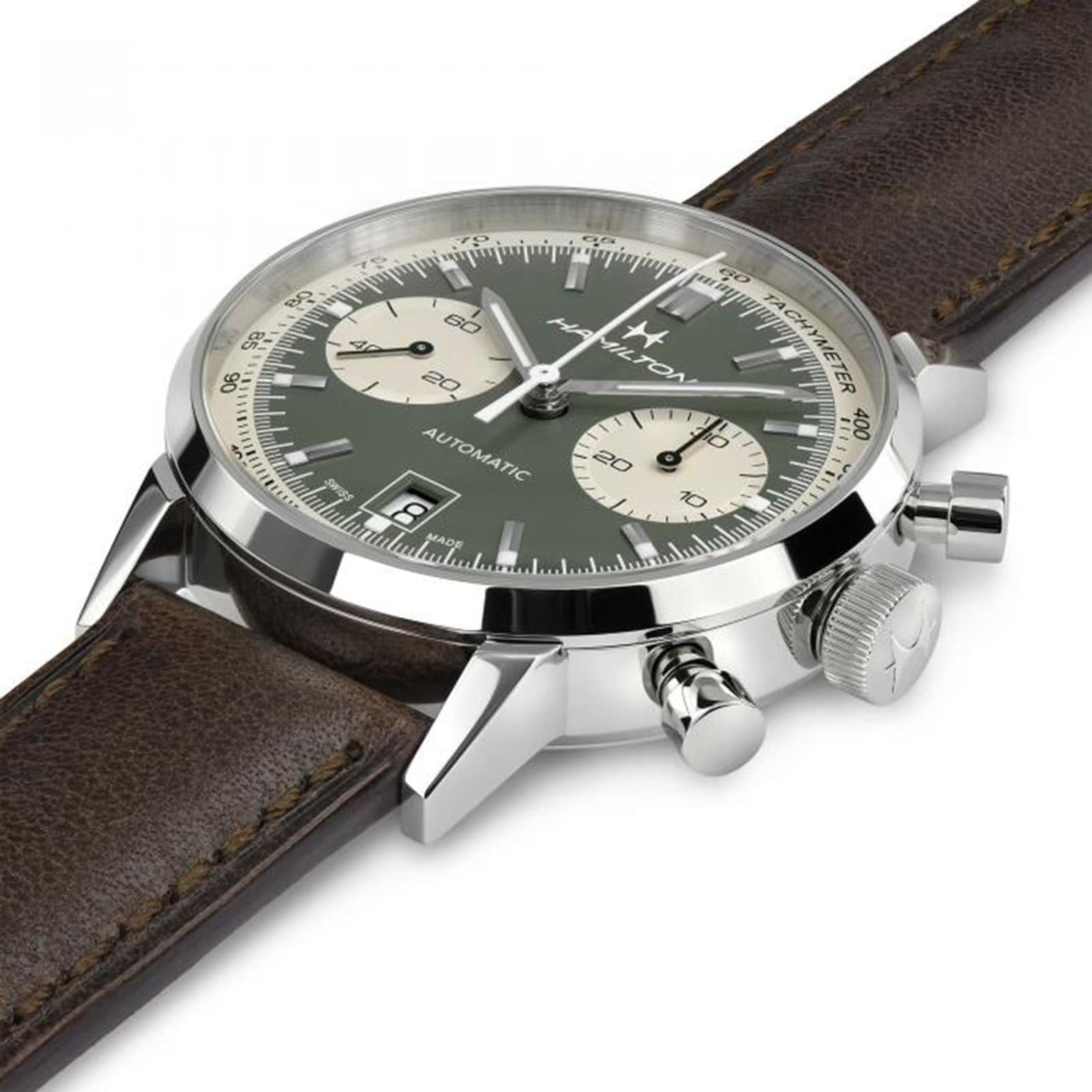 The Hamilton American Classic Intra-Matic Auto Chrono 40mm boasts vintage style with a stainless steel case, green dial, two subdials, brown leather strap, and prominent pushers and crown.