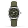 The Hamilton Khaki Field Mechanical features an olive green strap, black dial, white markers, and a date window at 3 o’clock.