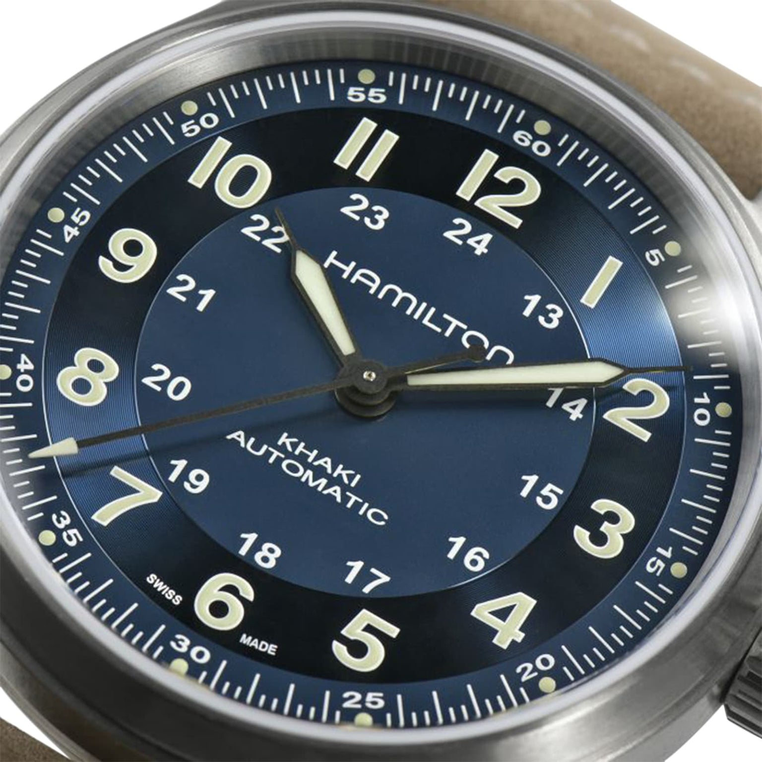 Close-up of the Hamilton Khaki Field Titanium Auto watch, featuring a blue dial, beige numerals, and luminous hands set at 10:10:37—a versatile timepiece made for adventure.