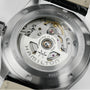 Close-up of the back of the Hamilton Khaki Field Murph 38mm watch, featuring an exposed automatic movement with 80-hour power reserve, engraved details, and a black leather strap.