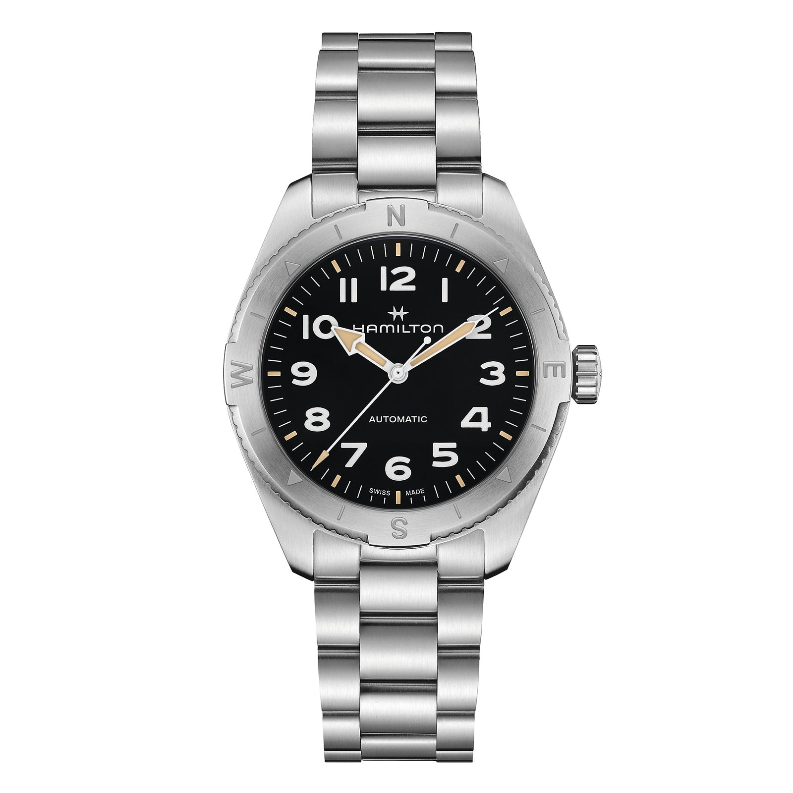 The Hamilton Khaki Field Expedition Auto is a stainless steel automatic watch featuring a black dial, silver Super-LumiNova hands, Arabic numerals, and a metal link bracelet.