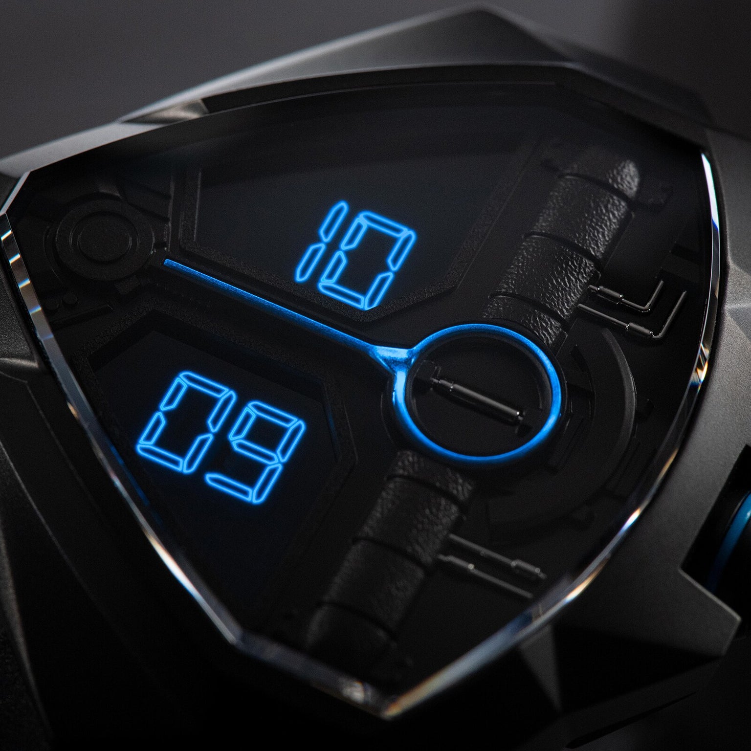 Close-up of the Hamilton Ventura Edge Dune Limited Edition watch face, featuring blue LED numbers (10:09) in a black, angular casing inspired by Dune Part Two.