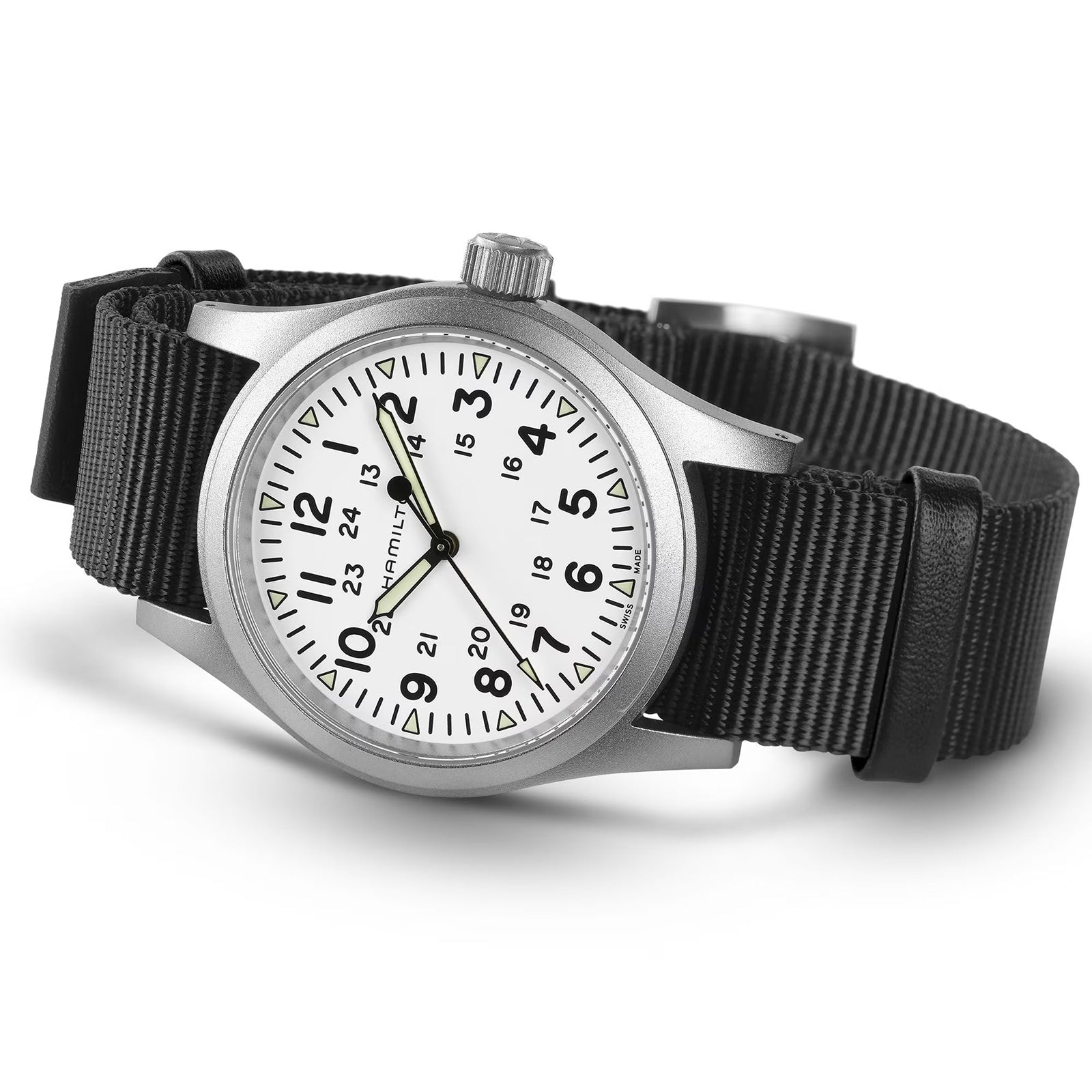 The Hamilton Khaki Field Mechanical wristwatch features a silver case, white dial with black Arabic numerals, date display, and a black NATO strap, shown on a white background.