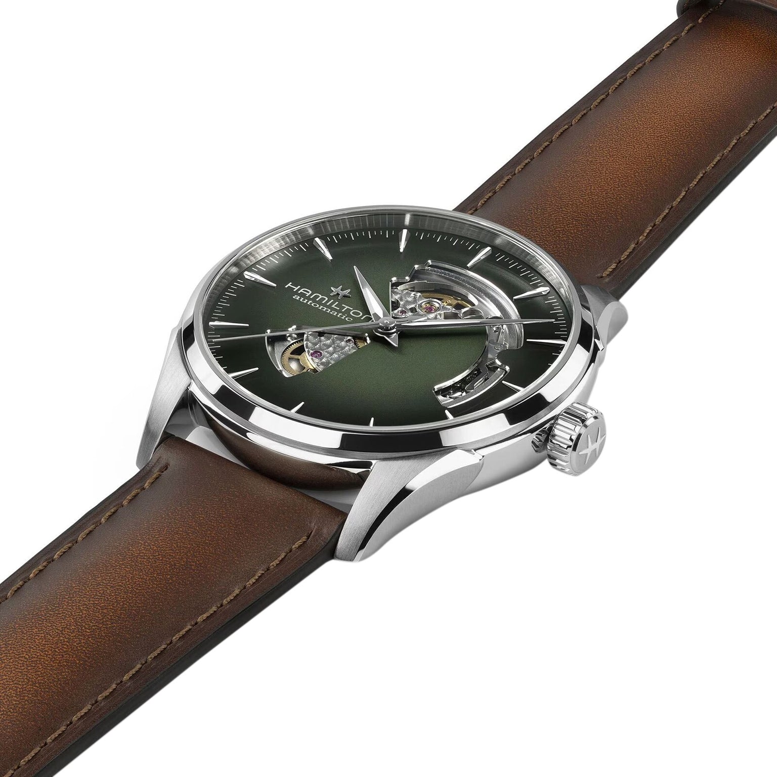 The Hamilton Jazzmaster Open Heart Auto 42mm features a green dial, brown leather strap, and exposed gears visible through cutouts on the face.