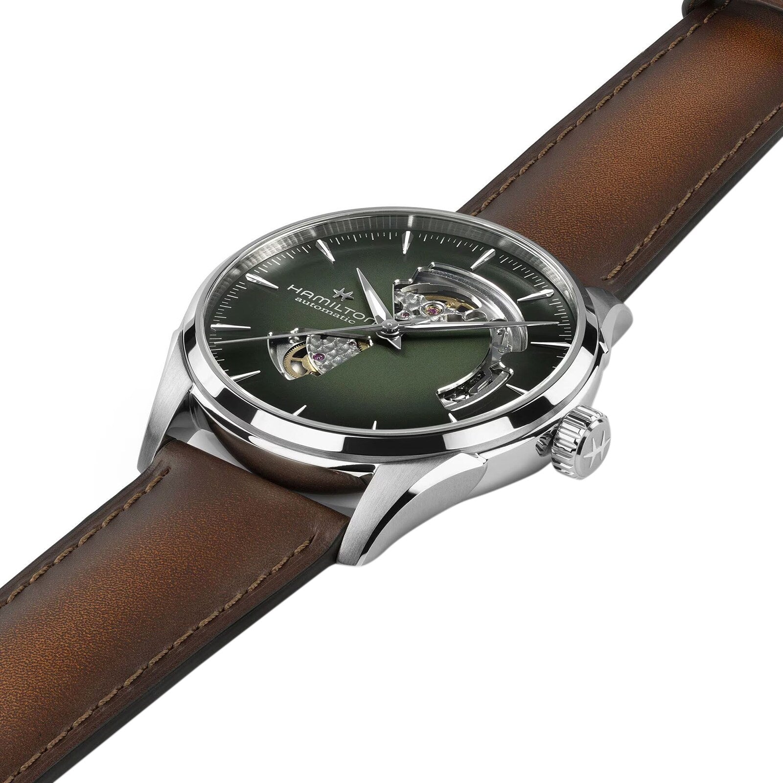 The Hamilton Jazzmaster Open Heart Auto 42mm features a green dial, brown leather strap, and exposed gears visible through cutouts on the face.