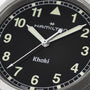 Close-up of a Hamilton Khaki Field Quartz 38mm watch face at 10:10:36, featuring luminous hands and numbers.