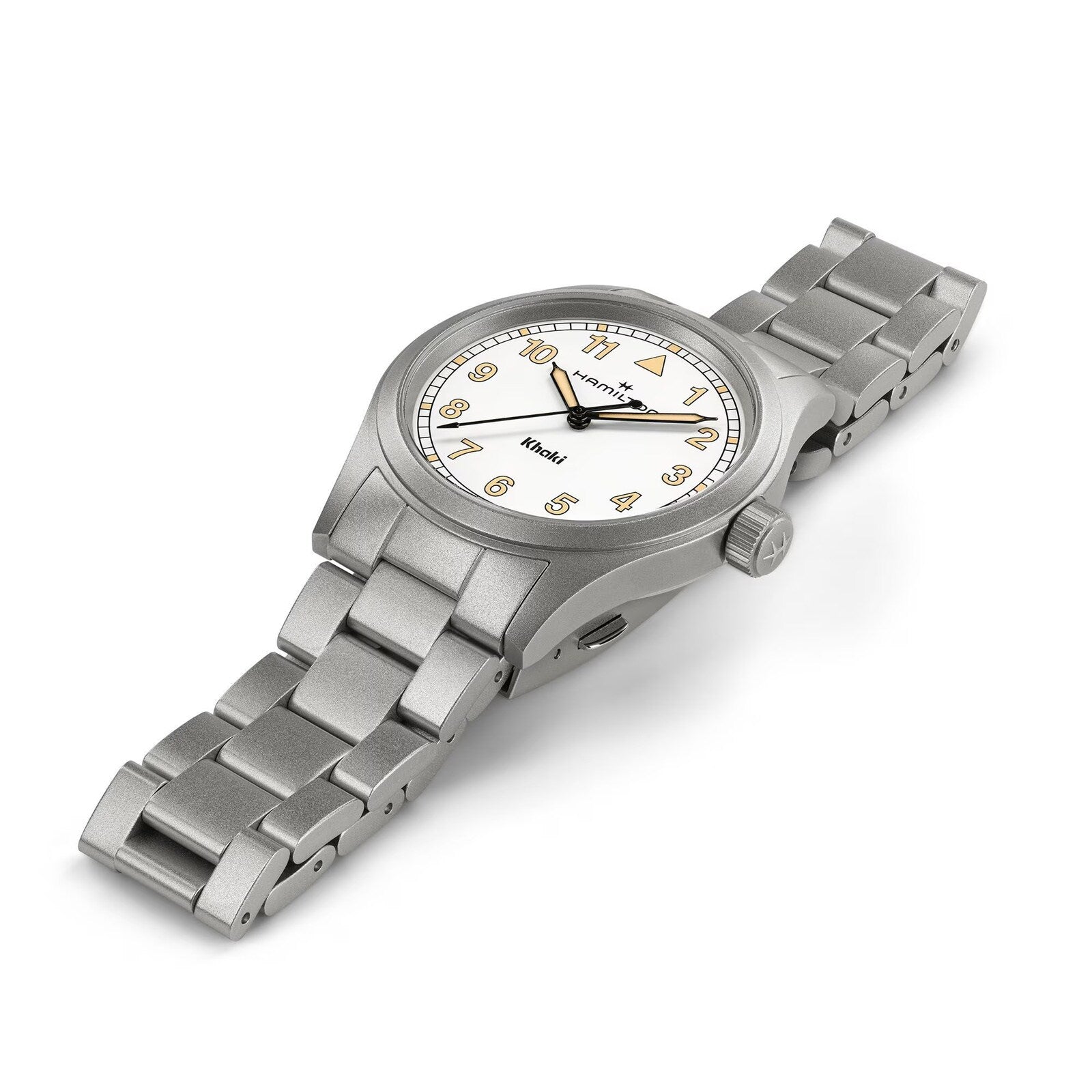 The Hamilton Khaki Field Quartz 33mm features a silver metal band, white dial, black hands, and yellow Arabic numerals, shown at an angle.