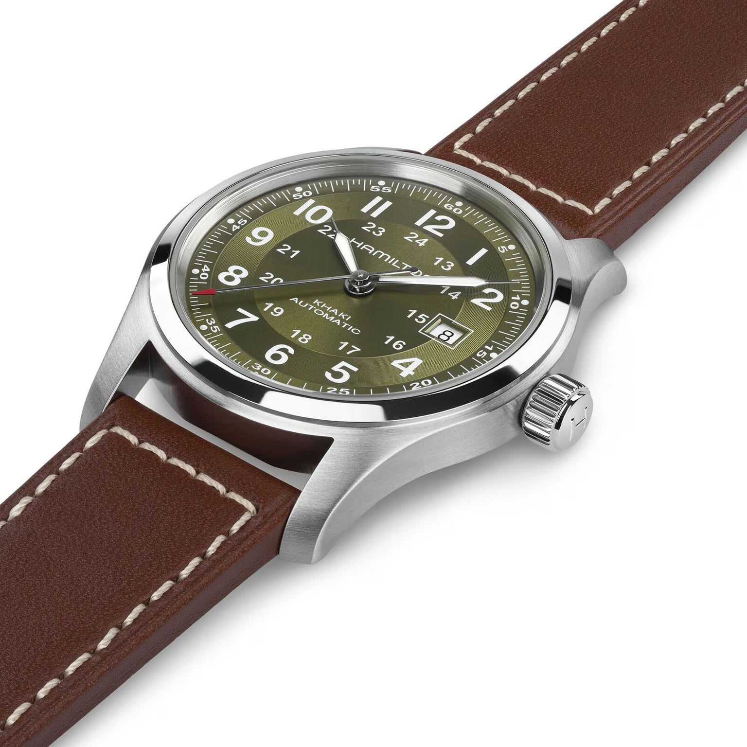 The Hamilton Khaki Field Auto 42mm is a silver wristwatch with an olive green face and brown leather strap, displaying the time 10:10.