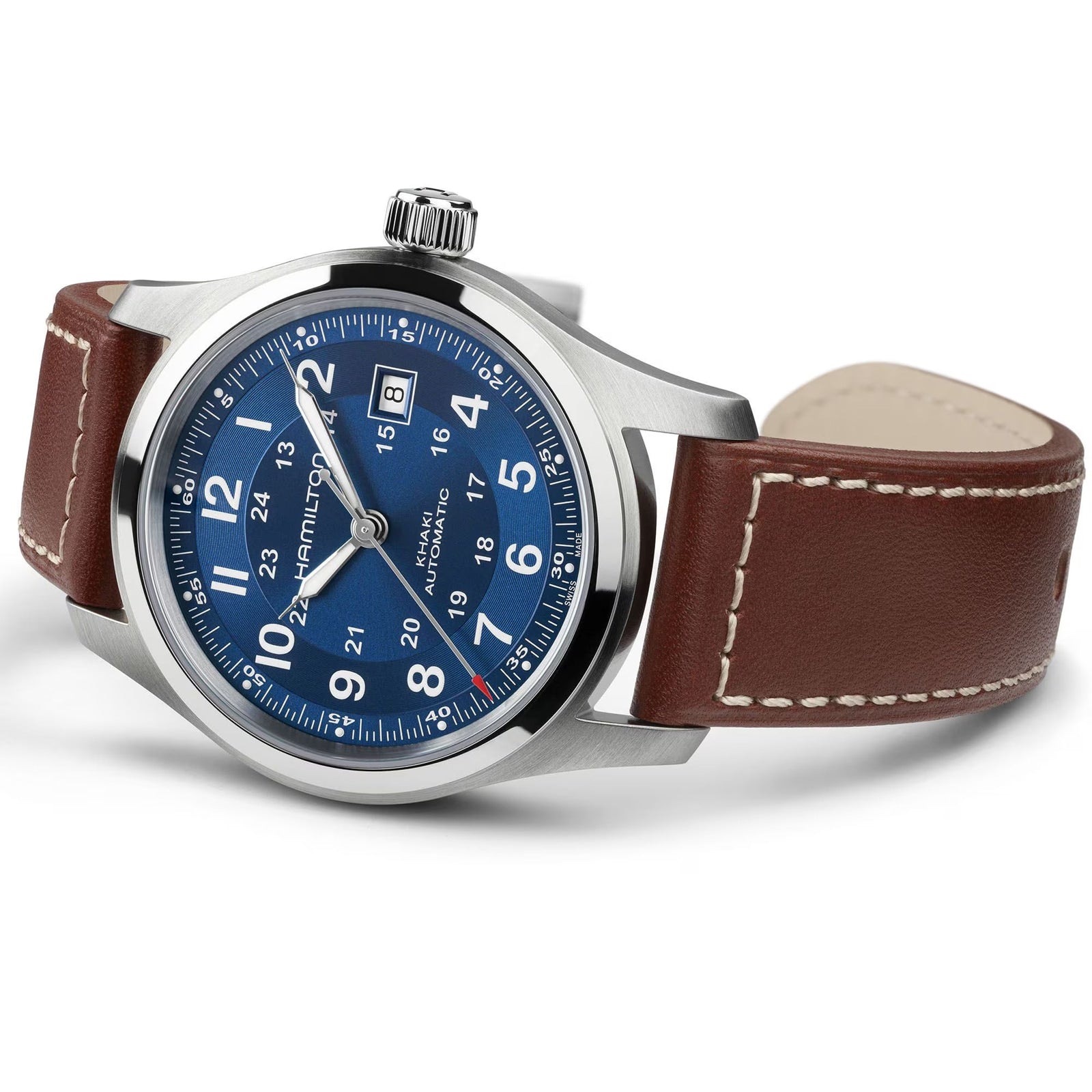 The Hamilton Khaki Field Auto 42mm features a blue dial, silver case, and brown leather strap with white stitching.