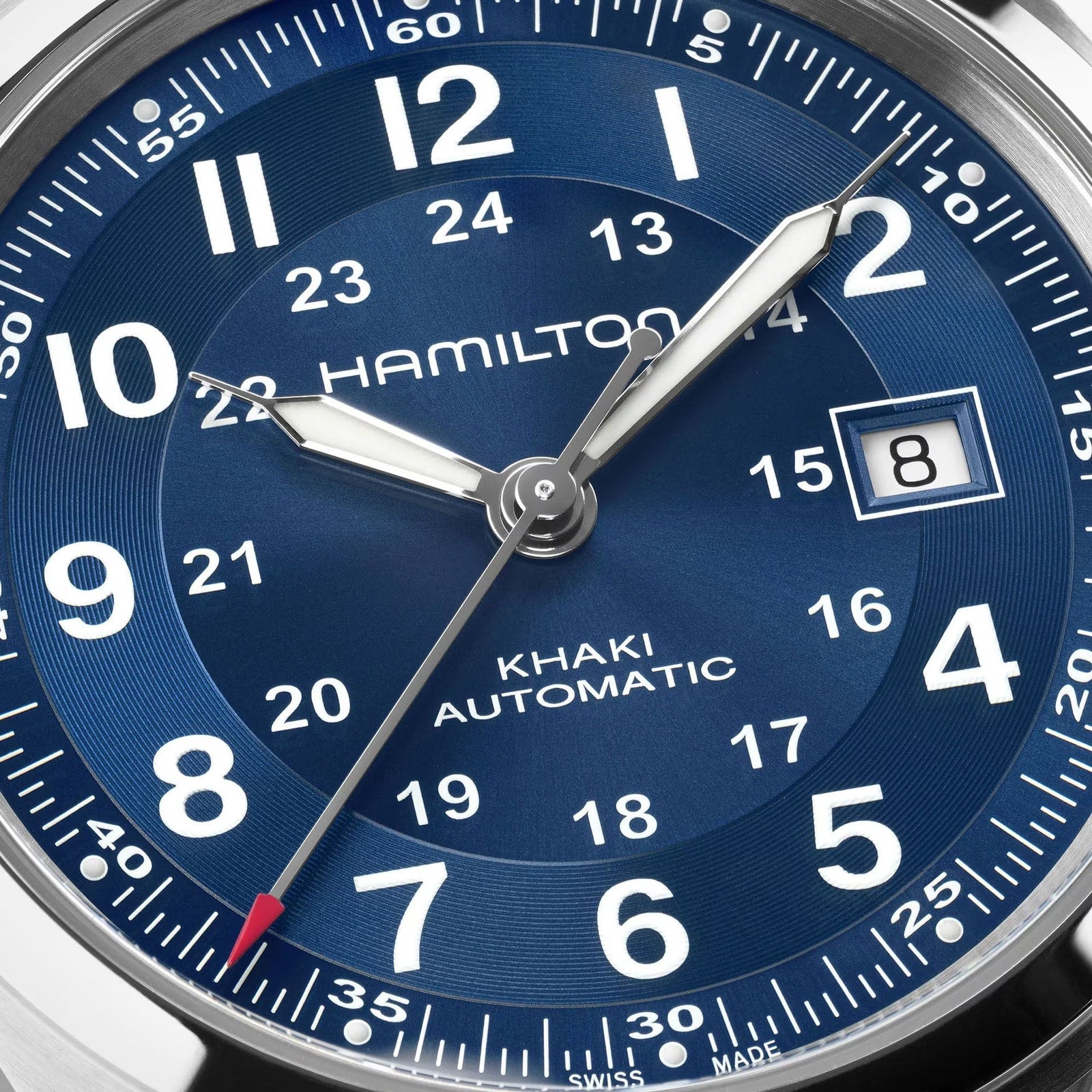 Close-up of a blue Hamilton Khaki Field Auto 42mm watch by Hamilton, displaying the time as 8:08 and the date as the 8th.