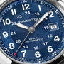 Close-up of a blue Hamilton Khaki Field Auto 42mm watch by Hamilton, displaying the time as 8:08 and the date as the 8th.