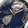 Close-up of the Hamilton Jazzmaster Open Heart Lady Auto dress watch with a blue speckled dial and exposed automatic movement visible through its signature open-heart design.