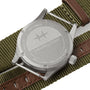 The back of the Hamilton Khaki Field Quartz 33mm features engraved branding, a star symbol, and a NATO-style green strap with brown leather accents, underscoring its military heritage and durable design.
