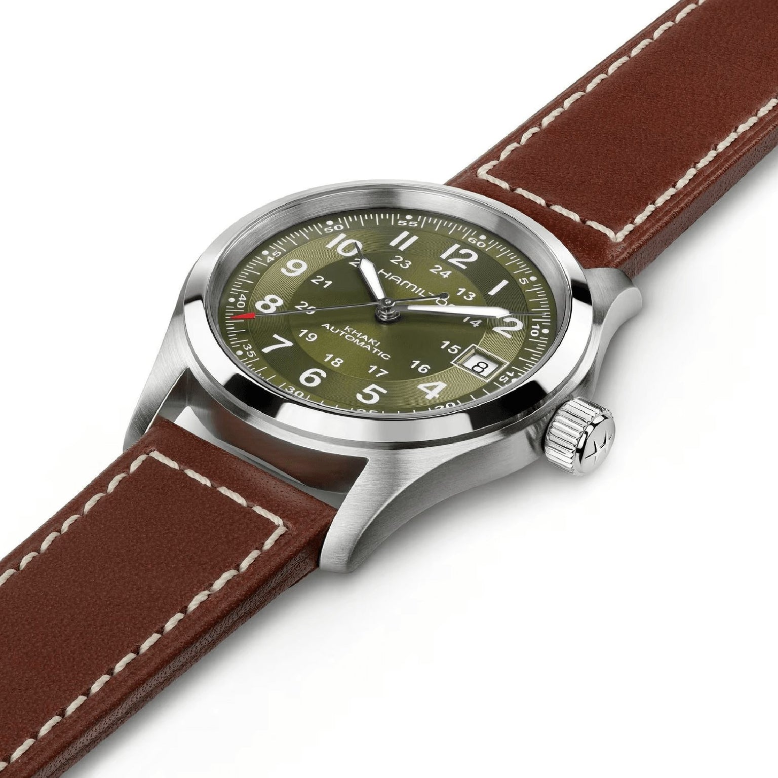 The Hamilton Khaki Field Auto 38mm is a stainless steel watch with military heritage, featuring an olive green dial, white numerals, date window, and a brown leather strap with white stitching.