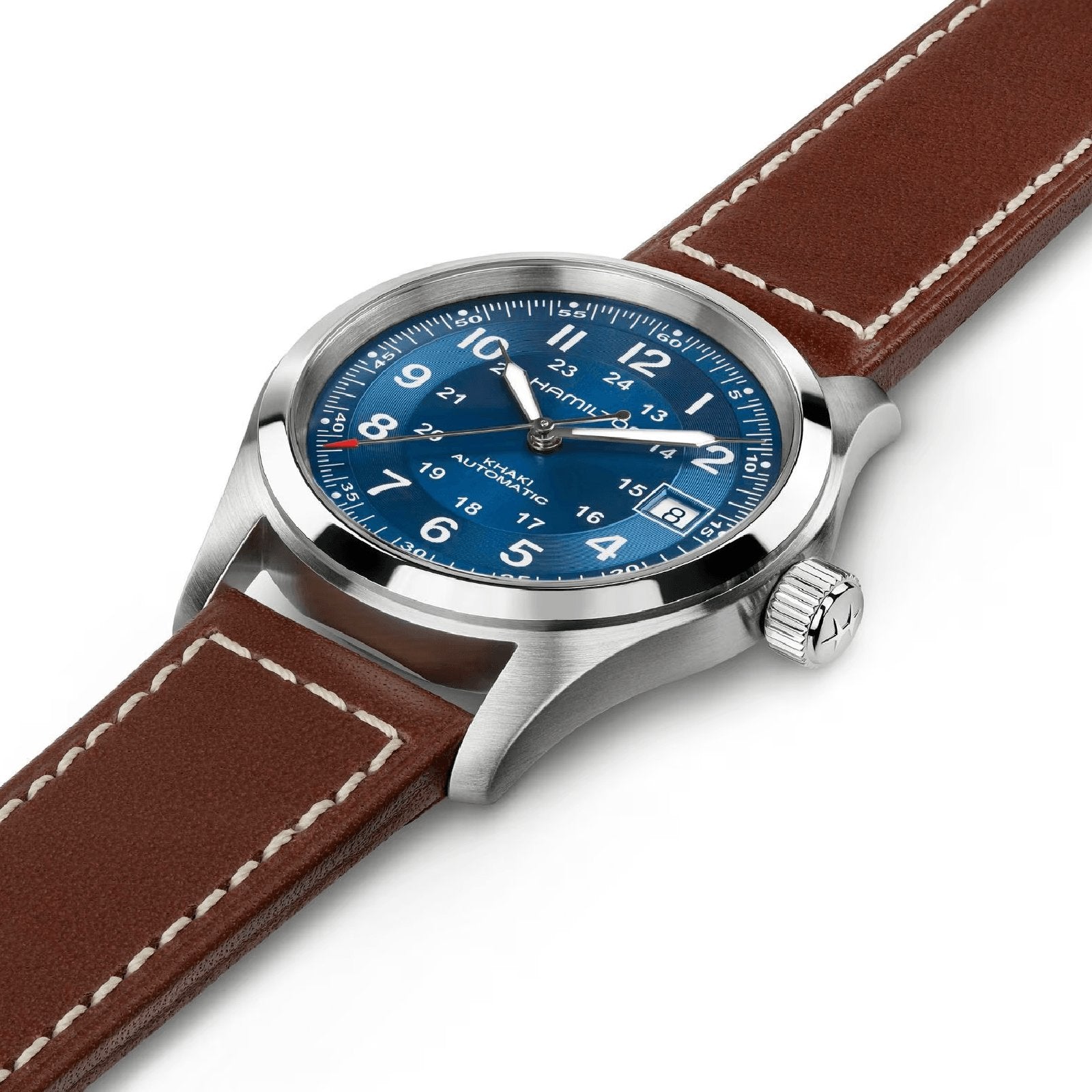 The Hamilton Khaki Field Auto 38mm features a stainless steel case, navy sunray dial with white numerals and date display, plus a brown leather strap with white stitching. Powered by the precise H-10 automatic movement.