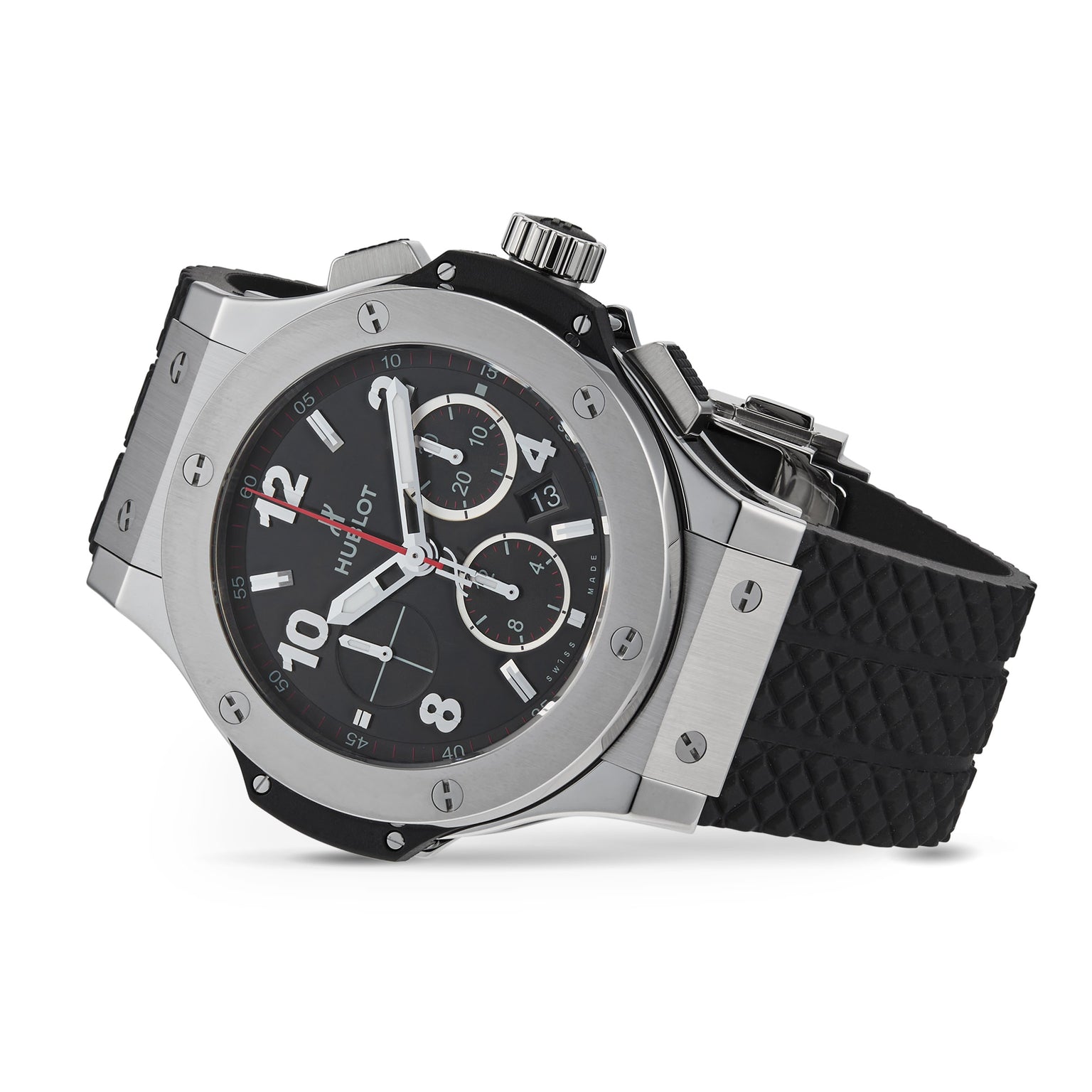 A Hublot Big Bang Original Steel chronograph watch in black and silver with a black textured rubber strap, displayed at an angle on a white background, highlights its sporty aesthetic.