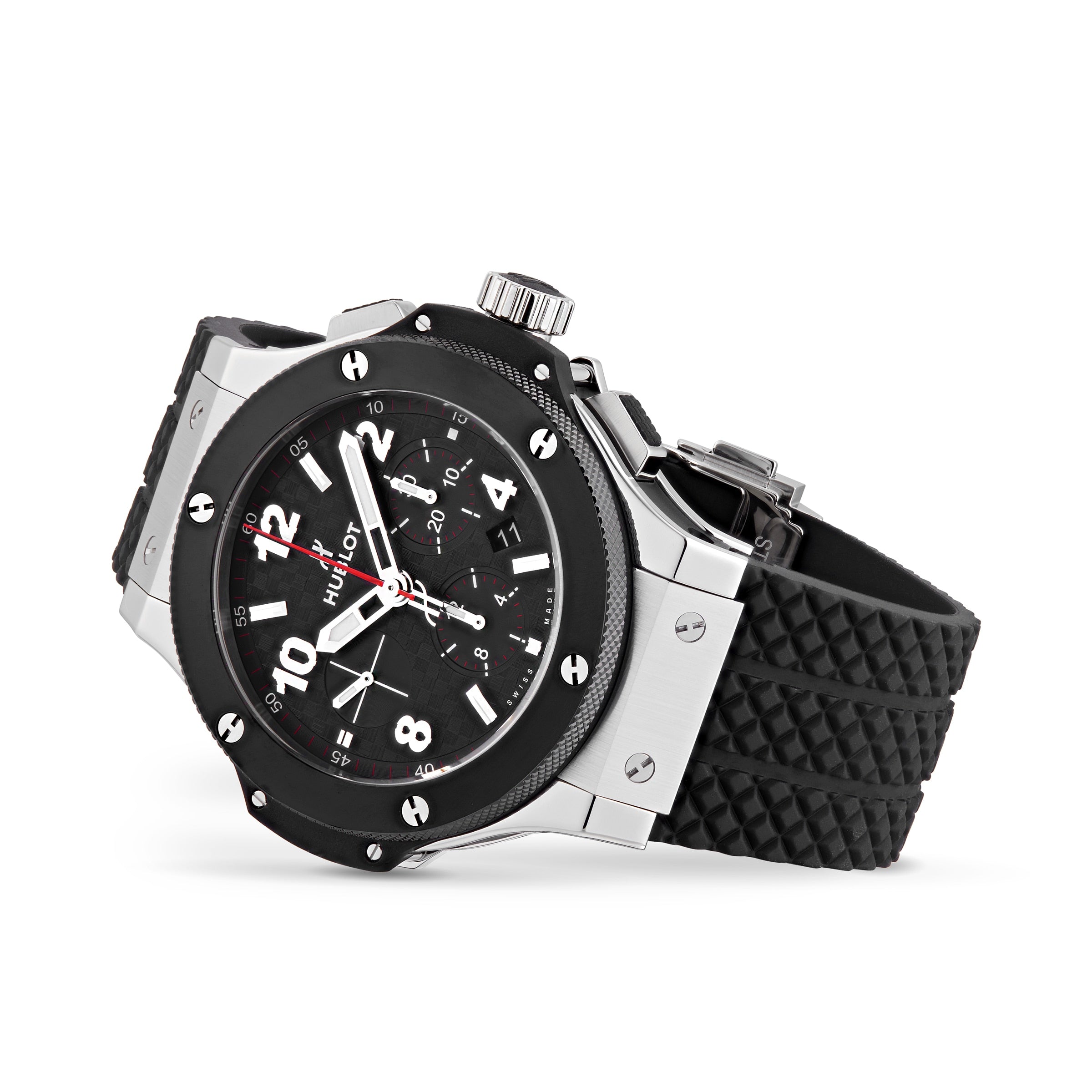 The Hublot Big Bang Original Steel Ceramic is a black and silver automatic chronograph wristwatch with a black textured rubber strap, black dial, white numerals, three subdials, and high-tech materials.