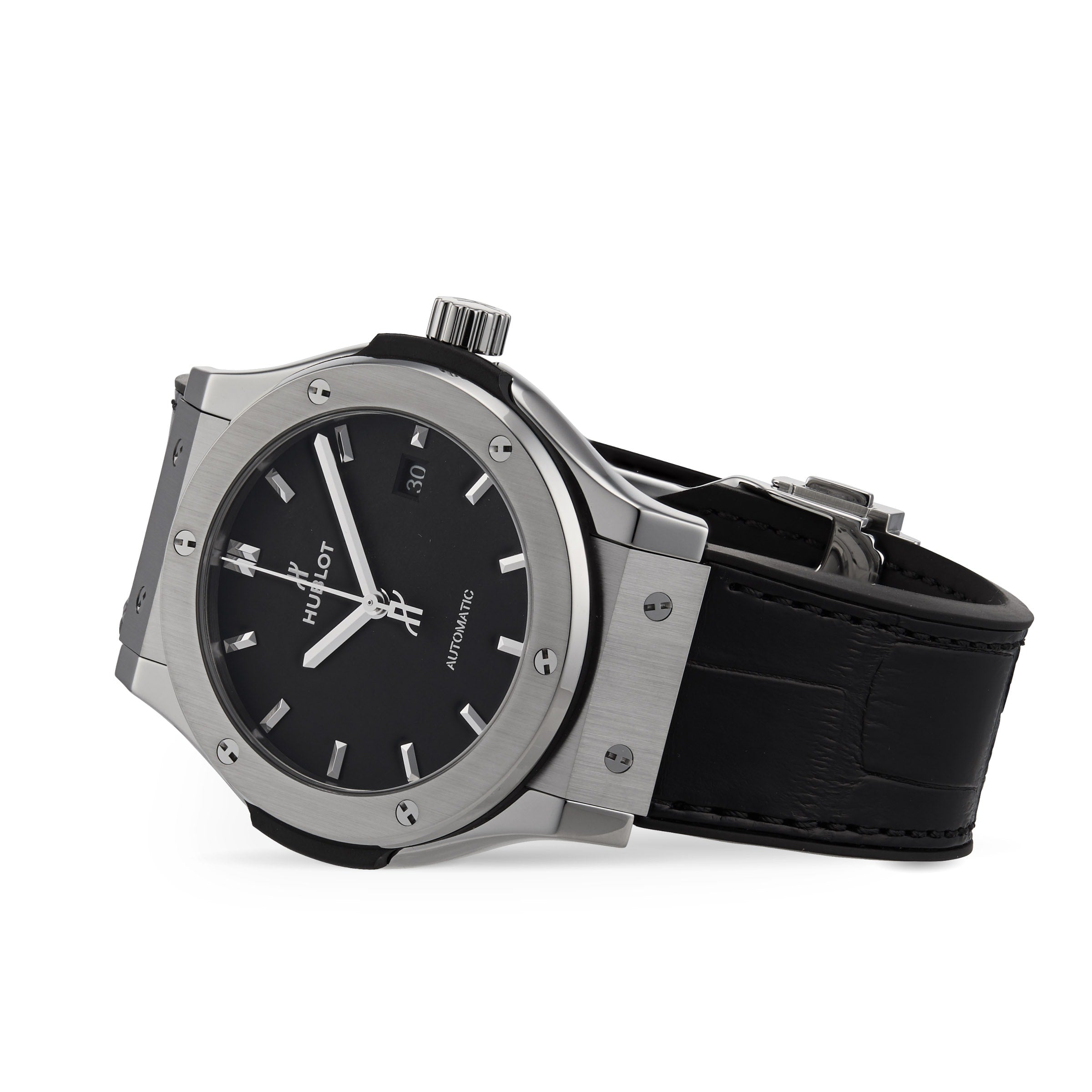 A Hublot Classic Fusion Titanium wristwatch with a black dial, silver hour markers, and a black leather strap with automatic movement, shown at an angle on a white background.