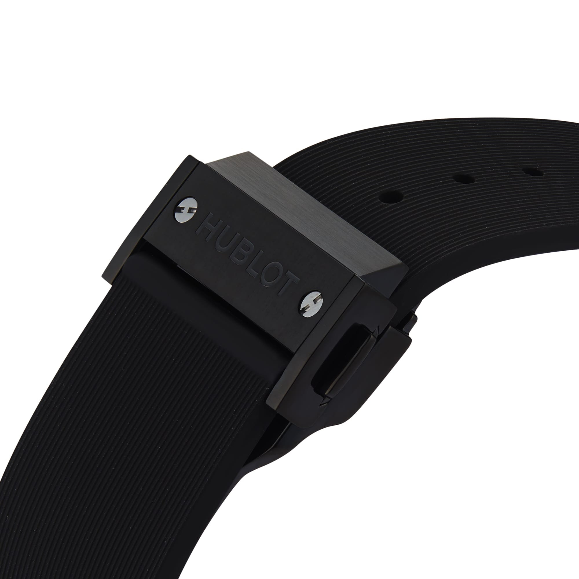 Angled close-up of a Hublot Classic Fusion Chronograph Black Magic clasp on a textured black rubber strap, highlighting its sleek black ceramic case for a modern, refined look.