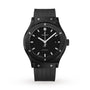 The Hublot Classic Fusion Black Magic features a black high-tech ceramic case, black dial with silver markers, date display at 3 o’clock, and a black rubber strap, shown on a white background.