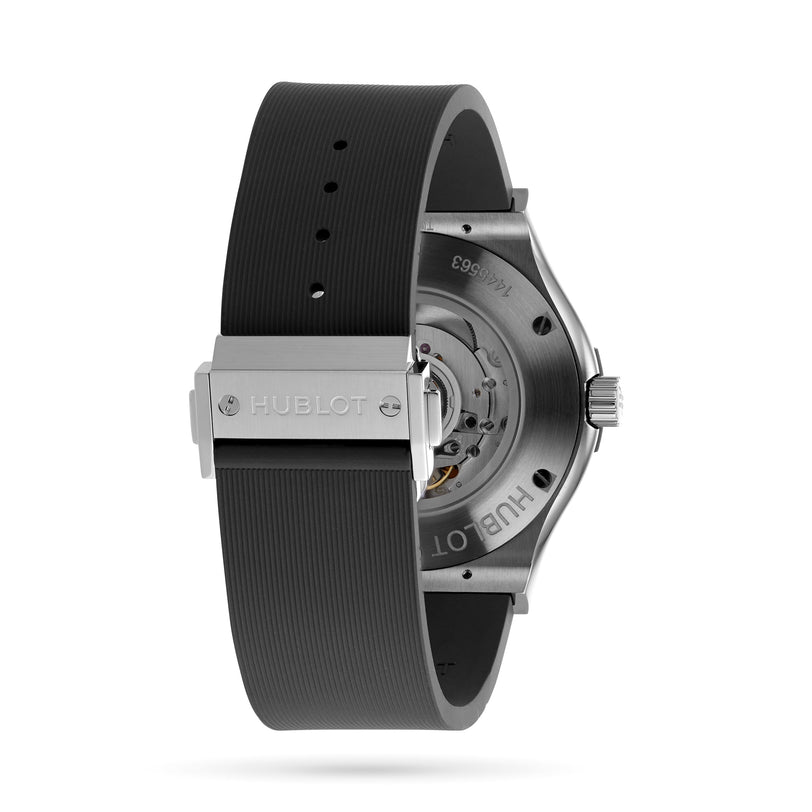 Back view of the Hublot Classic Fusion Racing Grey Titanium, highlighting its self-winding movement, black textured strap, and a clasp engraved with the Hublot logo.